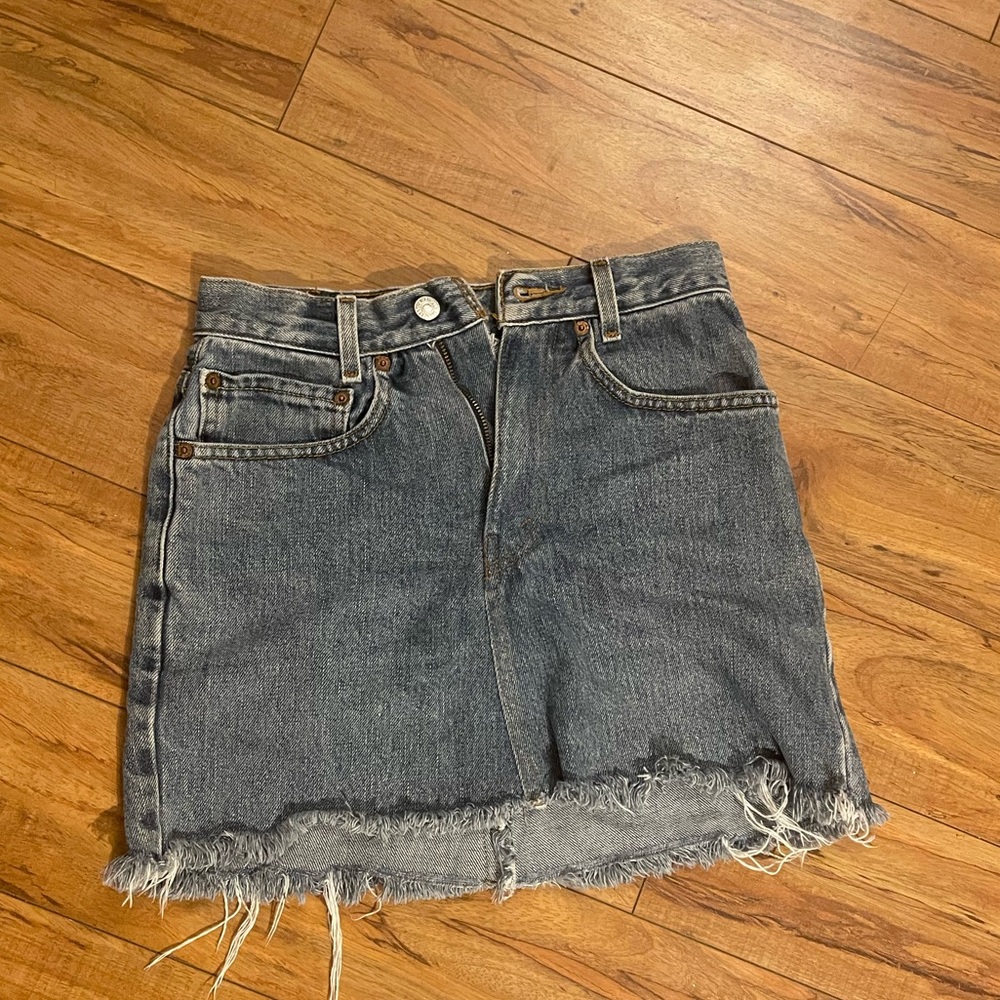 Levi jeans skirt. There are 3 stain spots in the back